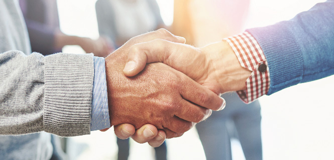 shake hands: Two men shaking hands